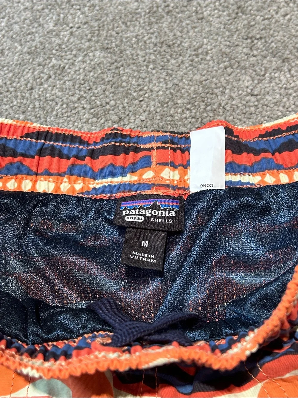 Patagonia Men’s Orange and Navy Wave-Pattern Hybrid Shorts